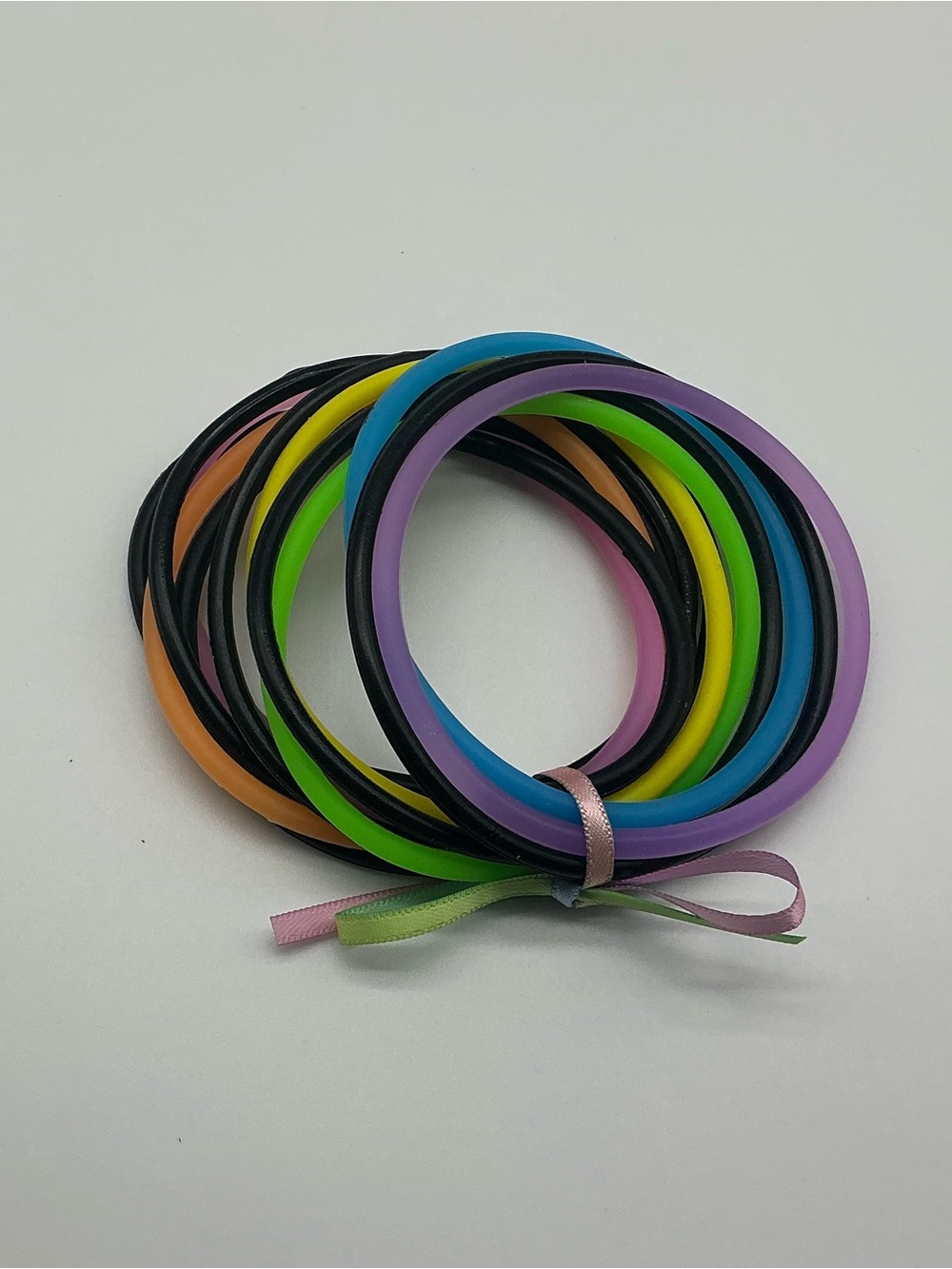 Set of 12 Black and Pastel Rainbow Colored Jelly Bracelets